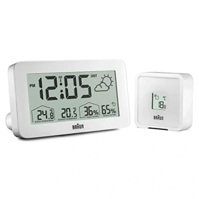 Abbildung von Braun Central European Time Zone (DCF) digitale Funkwetterstation mit Innen und Außentemperatur Luftfeuchtigkeitsanzeige, Prognose, LCD Display, Modell BC13WP DCF.