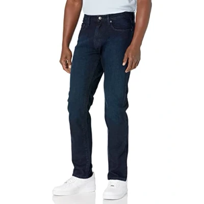 Abbildung von Amazon Essentials Herren Stretchjeans, athletische Passform, Blau Überfärben, 28W / 32L
