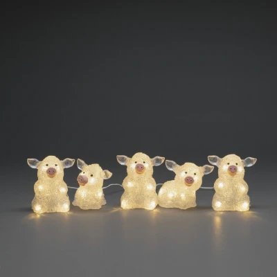 Abbildung von KONSTSMIDE LED Lichterkette »Schwein«, 40 St. flammig, Acryl Schweine 5 er Set, transparent, warm weiße Dioden
