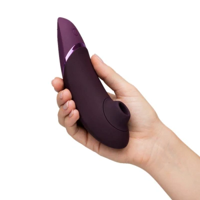 Abbildung von Womanizer Next Druckwellenvibrator Dunkellila