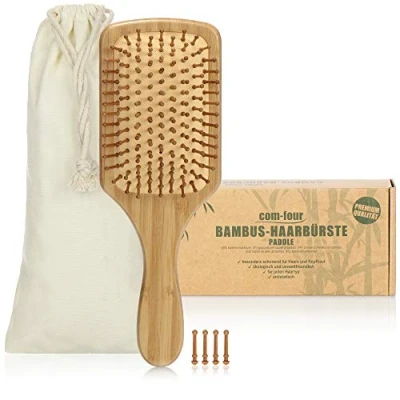 Abbildung von com four® Natur Haarbürste aus Bambus Paddelbürste mit Naturborsten Für natürlich schöne Haare Männer, Frauen, Kinder (1 Stück Paddelbürste)
