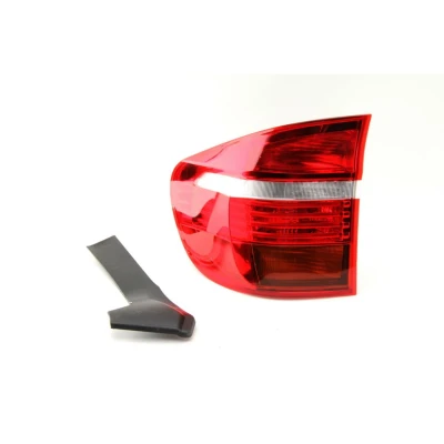 Abbildung von MAGNETI MARELLI 714021890702 Rückleuchte links äusserer Teil W16W, P21W mit Lampenträger BMW: X5