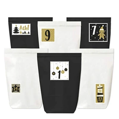 Abbildung von Papierdrachen Adventskalender zum Befüllen 24 Papiertüten in schwarz und weiß sowie Zahlenaufkleber (goldene Briefmarken) Selbermachen Weihnachten