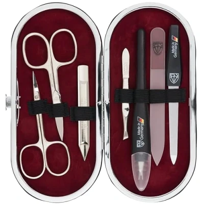 Abbildung von DREI SCHWERTER Germany 7 tlg. Maniküre Set &#039;Vittoria&#039; Nagel Etui in Kunstlackleder weinrot Inhalt: Nagelschere, Hautschere, Pinzette, Glasnagelfeile, Nagelhautmesser uvm