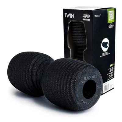 Abbildung von BLACKROLL® TWIN Faszienrolle (30 cm x 13 cm), Massagerolle mit Aussparung für die Wirbelsäule, Fitness Rolle punktuelle Selbstmassage und Regeneration, mittlere Härte, Made in Germany, Schwarz