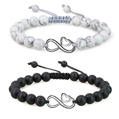 Abbildung von COAI Geschenkideen Partnerarmbänder aus Howlith und Mattem Onyx mit Ewig Zeichen Freundschaftsarmbänder Infinity Charm