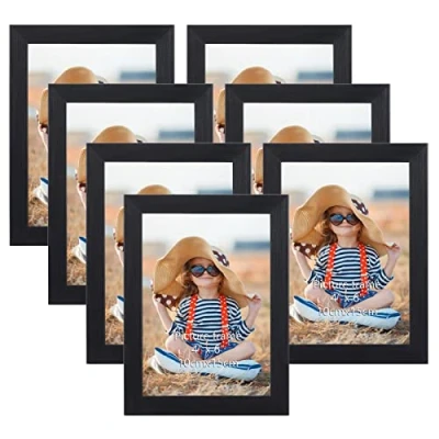 Abbildung von EXYGLO 7er Set Bilderrahmen 10x15 cm, Schwarz Fotorahmen Collage für 15x10 cm Fotos und Bilder, Dunkler Rahmen Leicht Dünn Wand oder Tischaufsteller