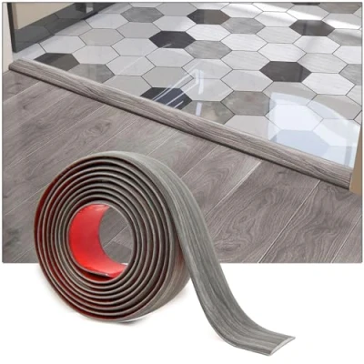 Abbildung von Art3d Selbstklebender Vinylbodenübergangsstreifen Laminatbodenstreifen flacher Bodentrennstreifen zum Verbinden von Bodenlücken Teppichschwellenübergang Fliesenboden 304x4x0,3cm grau