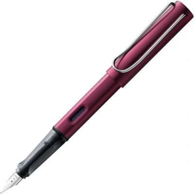 Abbildung von Lamy AL star black purple Füller Füllhalter mit ergonomischem Griff &amp; polierter Stahlfeder in Strichbreite F leichtes Aluminiumgehäuse inkl. Tintenpatrone T 10 blau Rechtshänder