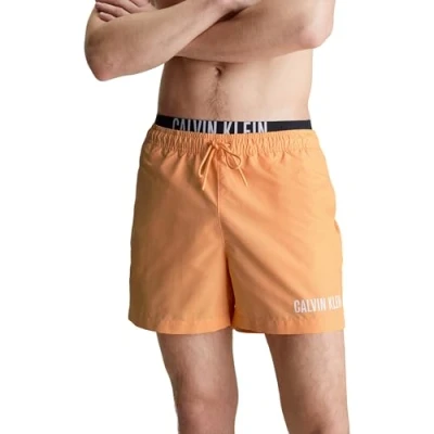 Abbildung von Calvin Klein Herren Badehose Medium Double Mittellang, Orange (Buff Orange), M