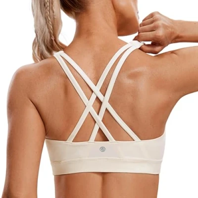 Abbildung von CRZ Yoga Damen Ohne Bügel Sport BH Gekreuzt Rücken Spaghetti Top Abnehmbare Pads Croptop Weiße Aprikose L
