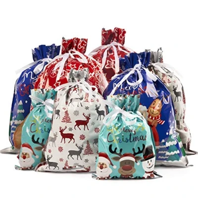 Abbildung von The TWIDDLERS 30 Geschenkbeutel mit Kordelzug, Geschenkpapier Weihnachten, Geschenkverpackung S, M, L &amp; XL für Xmas, Nikolaus Tüten Sortierte Größen