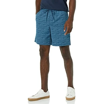 Abbildung von Amazon Essentials Herren Walkshorts, Beininnenlänge 20,3 cm, Lockere Passform, Mit Kordelzug (In Übergröße Erhältlich), Marineblau Palmwedelaufdruck, S