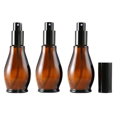 Abbildung von Leere nachfüllbare Sprühflaschen aus bernsteinfarbenem Glas, für Kosmetik und Parfüm, mit schwarzem Zerstäuber Staubschutzkappe ätherisches Öl / Aromatherapie
