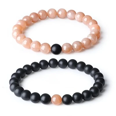 Abbildung von COAI Geschenkideen Freundschaftsarmbänder Partner Armband Distance Bracelets aus Matt Onyx und Sonnenstein