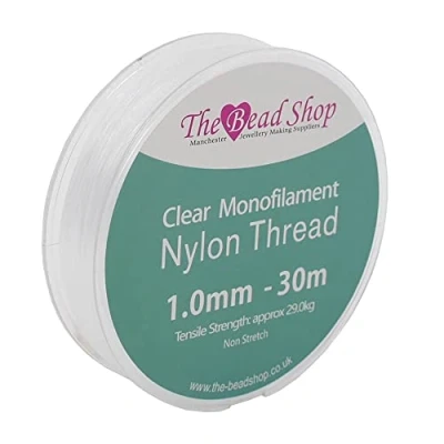Abbildung von The Bead Shop 1 mm transparenter Nylonfaden, unsichtbare Schnur, klares Nähgarn, Dekoration zum Aufhängen, nicht dehnbar, Zugfestigkeit ca. 29 kg (1 30 m Spule)