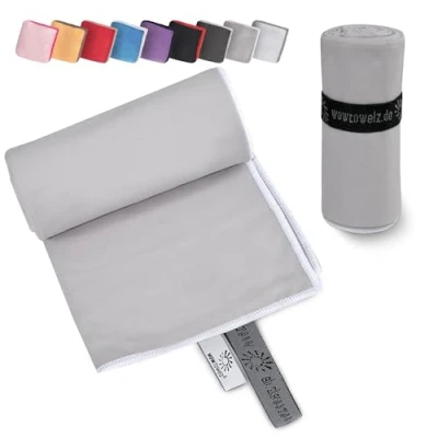 Abbildung von Wowtowelz kompaktes Mikrofaser Handtuch, Reisehandtuch, Sport Fitnesshandtuch, Strand Badetuch, leicht u. schnelltrocknend, (Hellgrau, 180 x 110 cm)