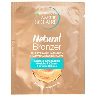 Abbildung von Garnier Ambre Solaire Selbstbräunungs Tuch, Selbstbräuner mit Aprikosenkernöl, Bräunungsbeschleuniger in Gold (15 Stück)