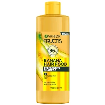 Abbildung von Garnier Fructis Bananen Shampoo, Für strapaziertes Haar, Sanfte Reinigung mit leichtem Schaum, mehr Geschmeidigkeit und gepflegtes Vegane Formel, Ohne Parabene, Hair Food, 3in1, 400ml