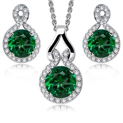 Abbildung von Crystalline Azuria Rund Grüner simulierter Smaragd Zirkonia Kristalle Schmuck Set Halskette Anhänger 45 cm Ohrringe 18 kt Weiß Vergoldet