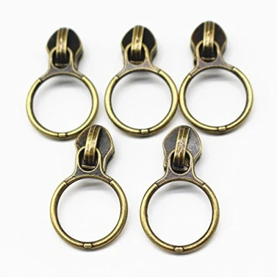 Abbildung von YaHoGa 50 Stück Bronzefarbene Nonlock Zipper für endlos Reißverschluss Meterware 6mm Spirale (Bronzefarbene)