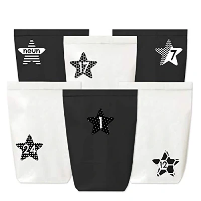 Abbildung von Papierdrachen Adventskalender zum Befüllen 24 Papiertüten in schwarz und weiß sowie Zahlenaufkleber (schwarz weiße Sterne) Selbermachen Mini Set 40 Weihnachten