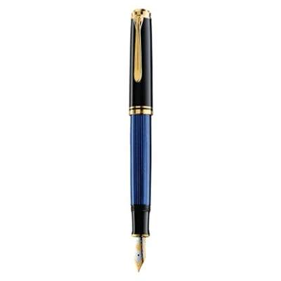 Abbildung von Pelikan Füllhalter Souverän 400, Schwarz Blau, Feder M (mittel), hochwertiger Kolbenfüller im Geschenk Etui, 994947
