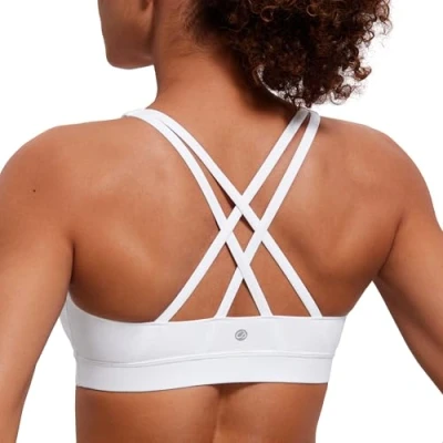 Abbildung von CRZ Yoga Damen Ohne Bügel Sport BH Gekreuzt Rücken Spaghetti Top Abnehmbare Pads Croptop Weiss Logo S