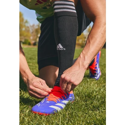 Abbildung von adidas Performance Predator PRO FIRM Ground Fußballschuh Nocken, Herren, Größe: 39 1/3, Core black/grey four/lucid red Schuhe