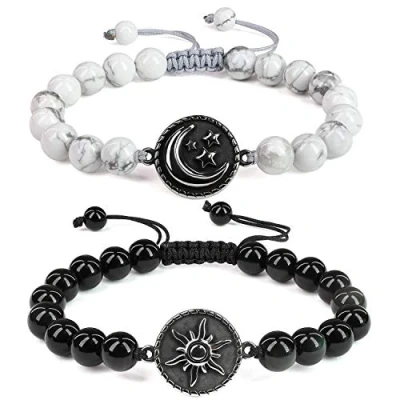 Abbildung von COAI Geschenkideen Yin und Yang Armbänder aus Obsidian Howlith mit Sonne Mond Charm für Pärchen