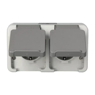 Abbildung von Schneider Electric Merten MEG2321 8029 Aufputz Klappdeckel Steckdose Feuchtraum 2 Fach, Schutzkontaktsteckdose, Waagerecht Angeordnet IP44, Aquastar, Lichtgrau