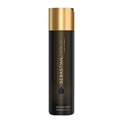 Abbildung von SEBASTIAN PROFESSIONAL DARK OIL Schwereloses Shampoo für alle Haartypen mit Jojoba und Arganöl sanfte Pflege intensiven Glanz 250 ml