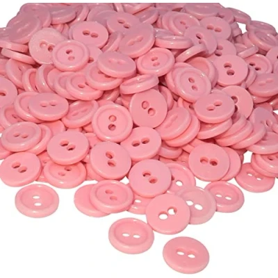 Abbildung von AERZETIX C56348 Set mit 100 runden Knöpfen Ø11,5x2,2 mm 2 Löchern rosa Farbe aus Kunststoff Durchmesser der Öffnung