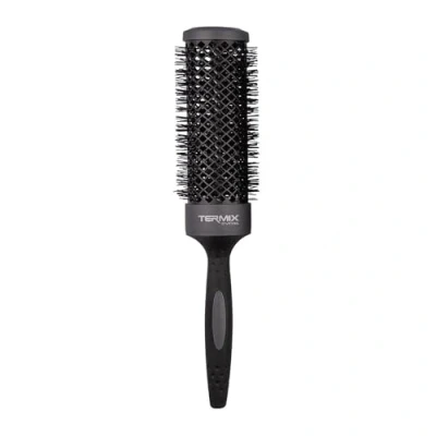 Abbildung von Termix Evolution XL. Thermische Rundhaarbürste mit 3 cm längerem Keramikrohr für langes Haar. Reduziert dank seiner ionisierten Fasern und des Anti Haft Rohrs die Trocknungszeit. Durchmesser: 43 cm.
