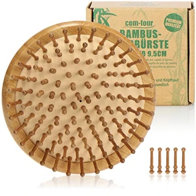 Abbildung von com four® Premium Bambus Haarbürste, Detangler Haarbürste aus Bambusholz, kleine runde Entwirrbürste gegen verfilzte Haare, für jeden Haartyp (1 Stück Tangle Bürste)