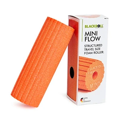 Abbildung von BLACKROLL® MINI FLOW Faszienrolle (15 x 5 cm), kleine Fitness Rolle mit geriffelter Oberfläche, handliche Massagerolle für unterwegs, im Büro &amp; Fitnessstudio, mittlere Härte, Made in Germany, Orange