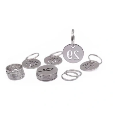 Abbildung von NanTun 23 mm Edelstahl Nummernschilder, 50 Stück, Schlüsselanhänger mit Ringen für Zahlen 1 bis