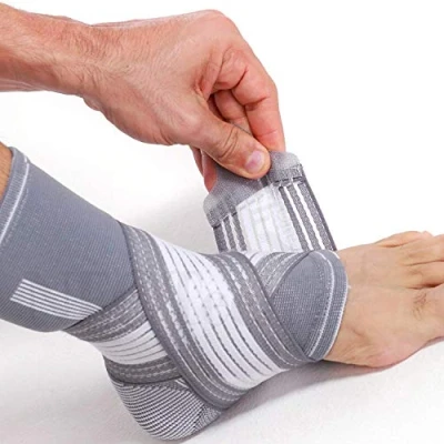Abbildung von NEOtech Care Sprunggelenkbandage zur Unterstützung elastischer &amp; atmungsaktiver Stoff verstellbarer Kompressionsriemen Männer, Frauen linker oder rechter Fuß Grau (1 Einheit, Größe M)