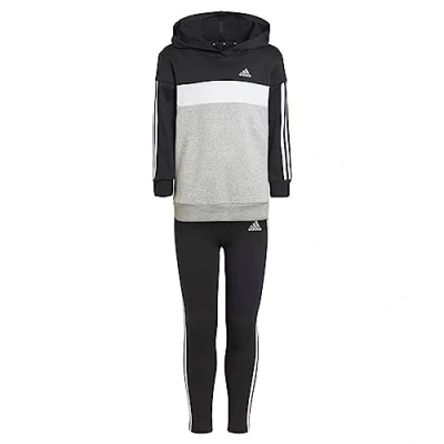 Abbildung von adidas, Essentials 3 Stripes Tiberio, Trainingsanzug, Oben: Schwarz/Weiß/Mittel Grauer Heather Unten: Schwarz/Weiß, 3/4A, Mädchen